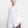 Chemisier en coton avec applications au crochet